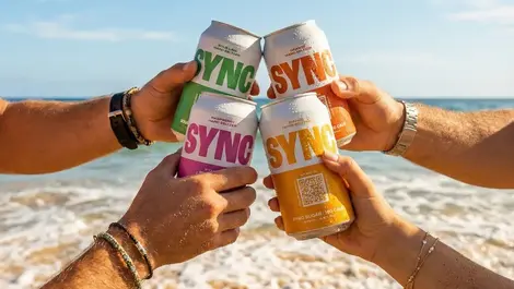 Sync core cheers at the beach